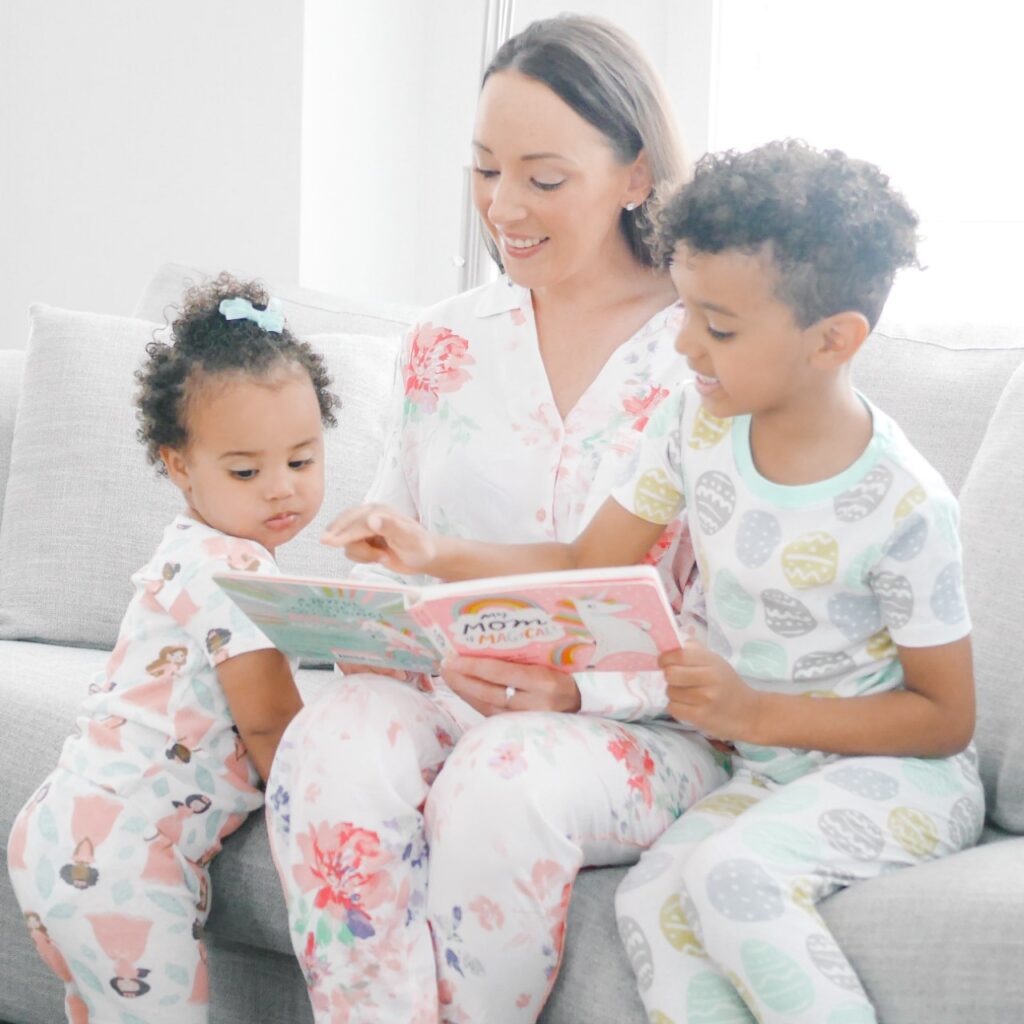 mom reading book to kids
