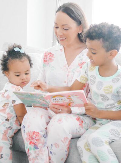 mom reading book to kids